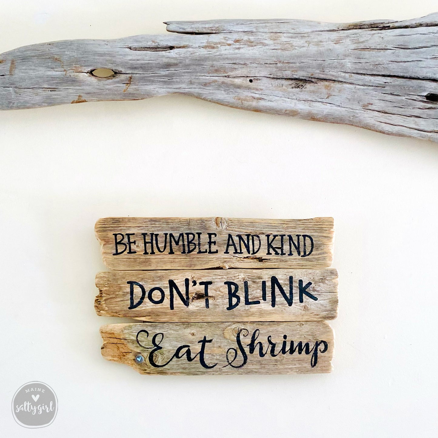 a wooden sign that says be humble and kind don't blink eat shrimp