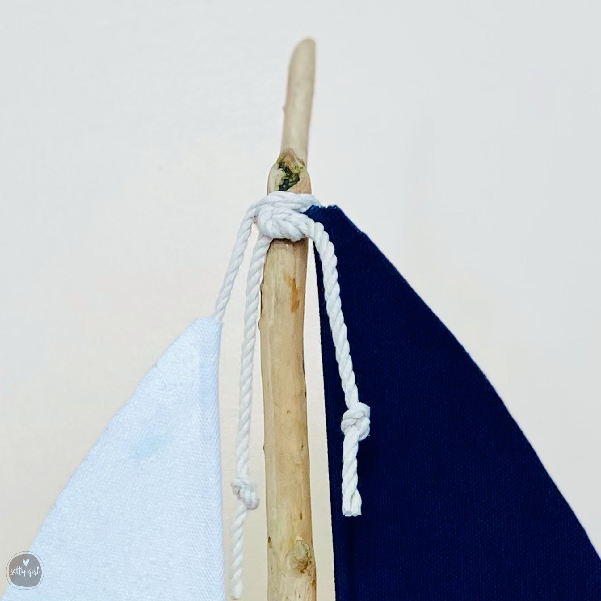 a close up of a blue and white umbrella