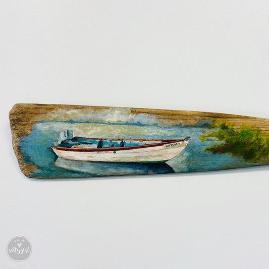 a painting of a boat floating on a body of water