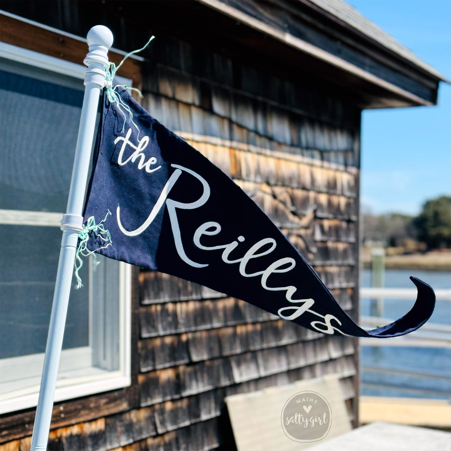 a blue and white flag with the words the reillys on it