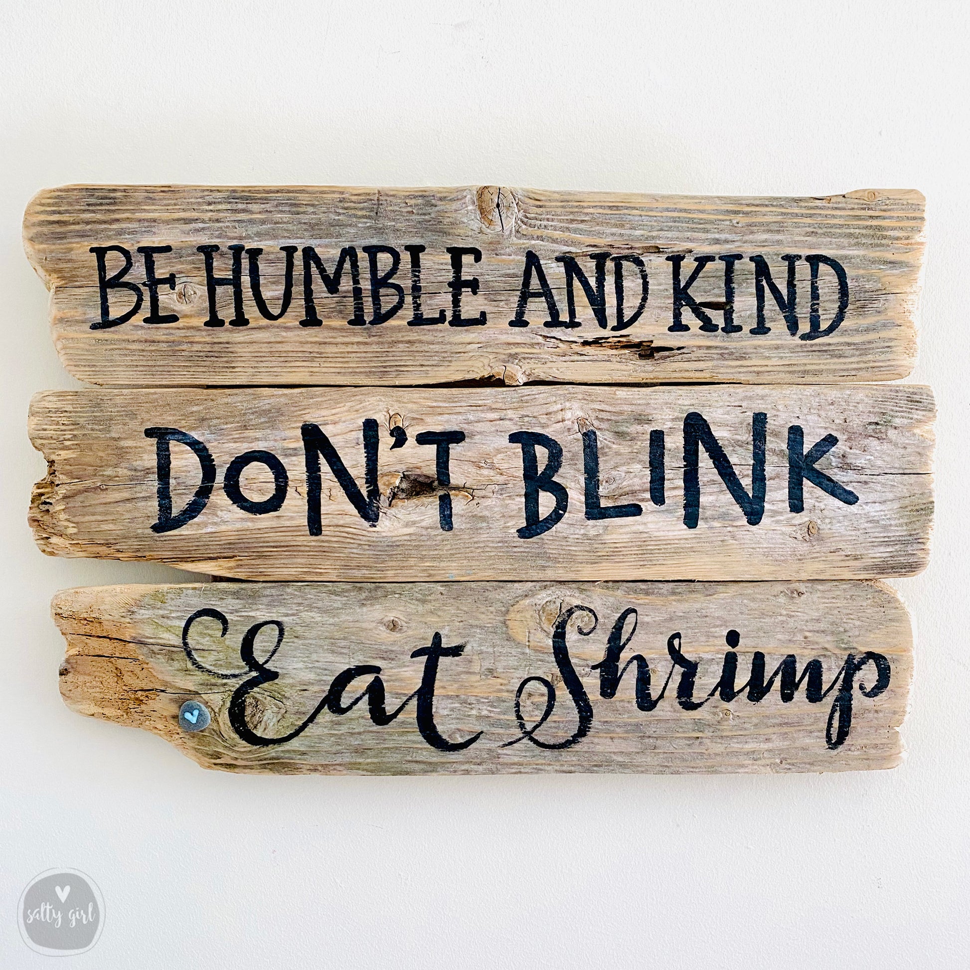 a wooden sign that says be humble and kind don't blink eat shrimp