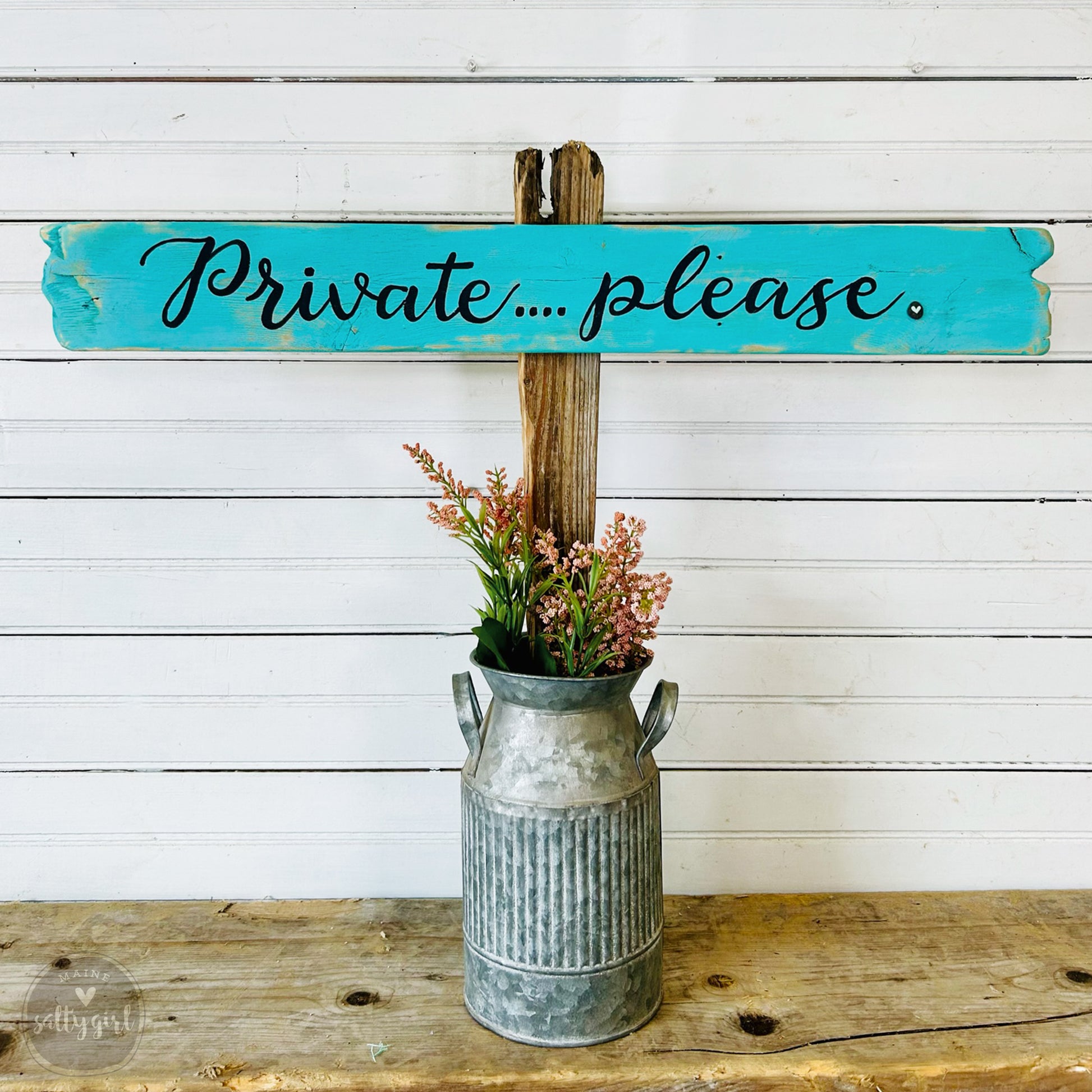 a sign that says private please on it