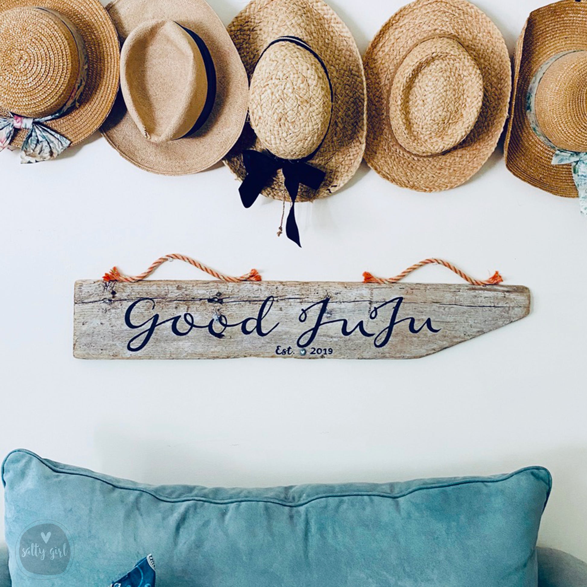 a group of hats hanging on a wall