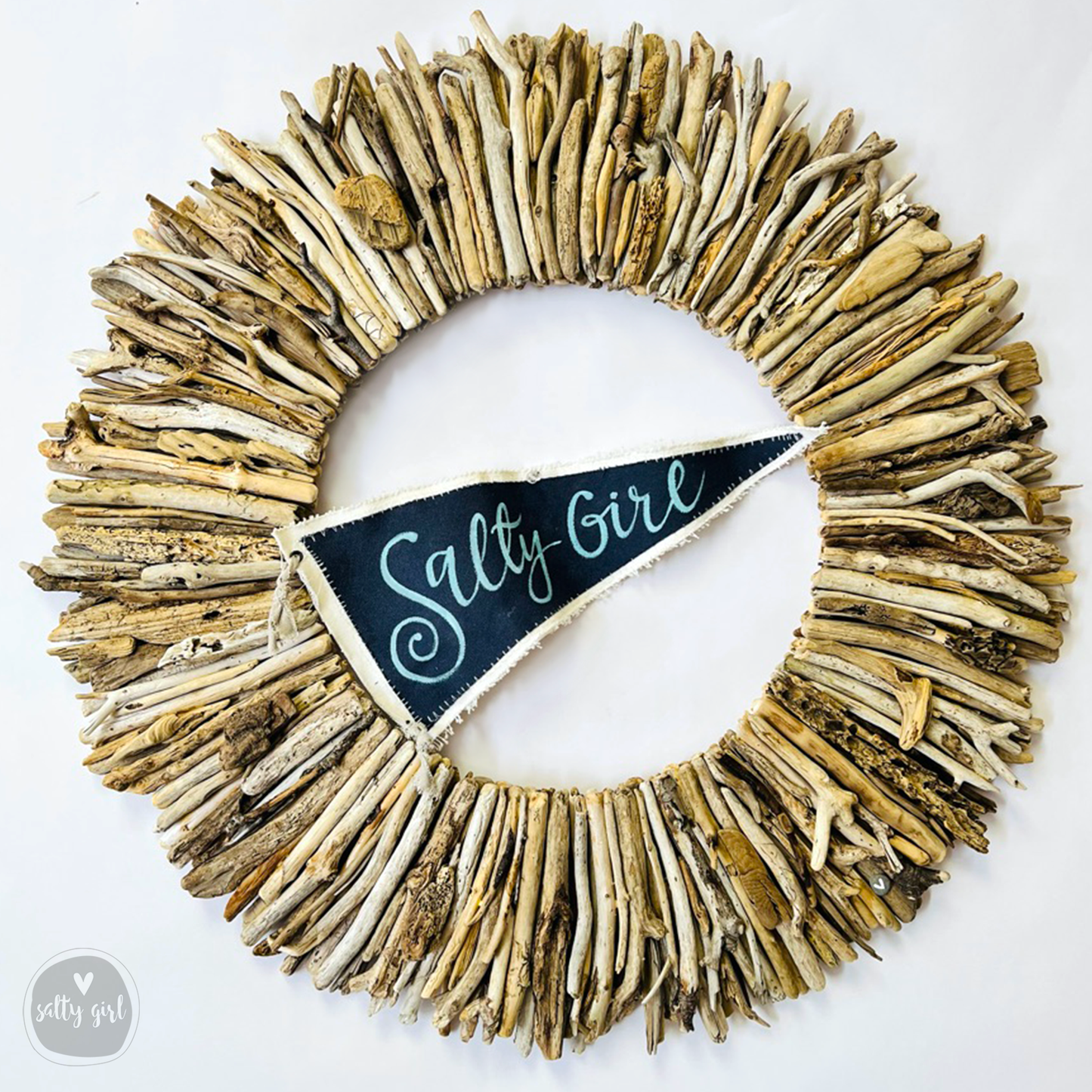 driftwood wreath with blue and white "Salty Girl" flag