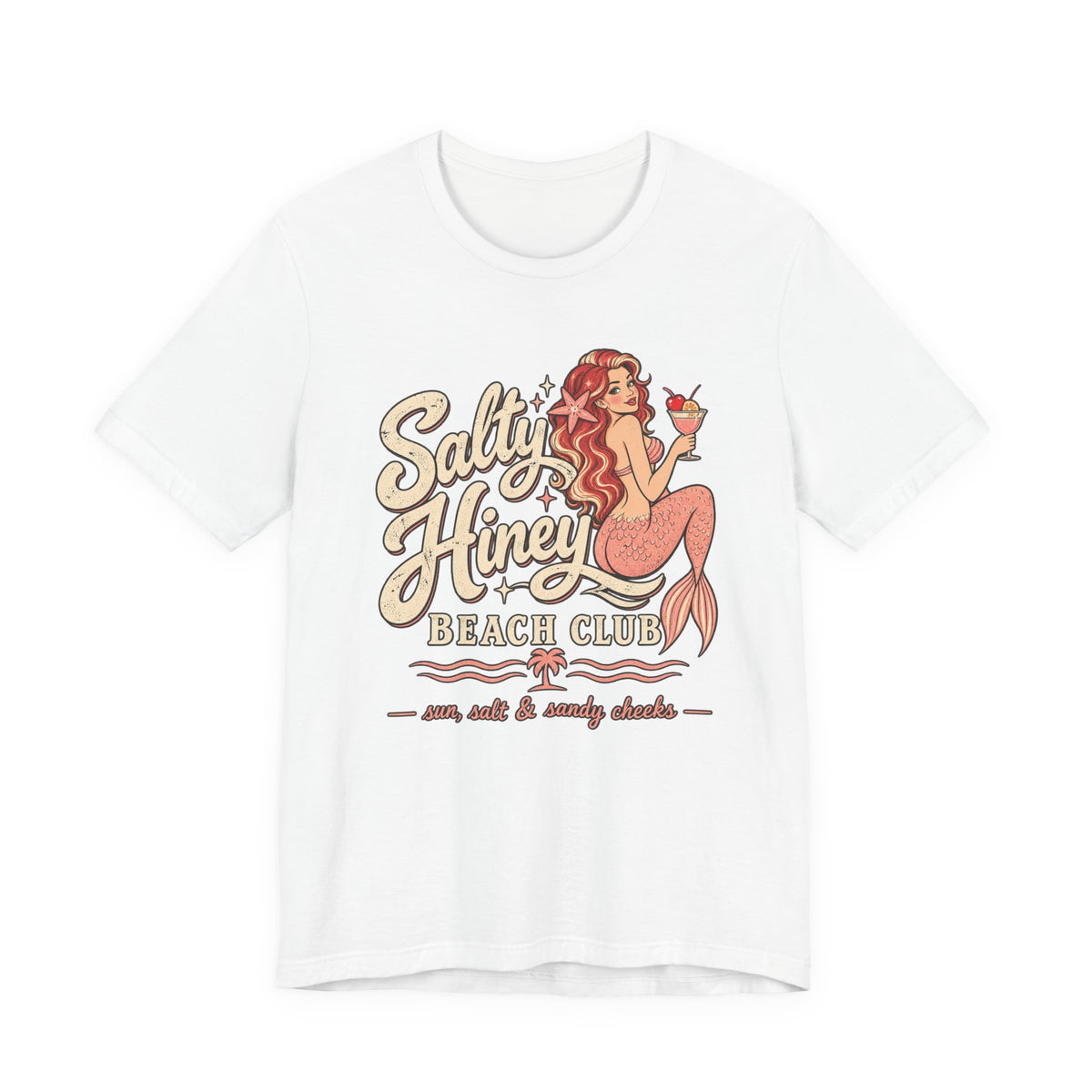 A white t-shirt with a graphic design featuring a mermaid holding a drink and the text "Salt & Honey Beach Club" along with the phrase "sun, salt & sandy checks".