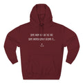 A maroon Maine Salty Girl hoodie with a quote printed on it.