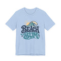 A light blue t-shirt with a graphic design featuring the text "BEACH BUM" and a sun-like symbol.