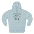 A light blue hoodie with a printed message on it.