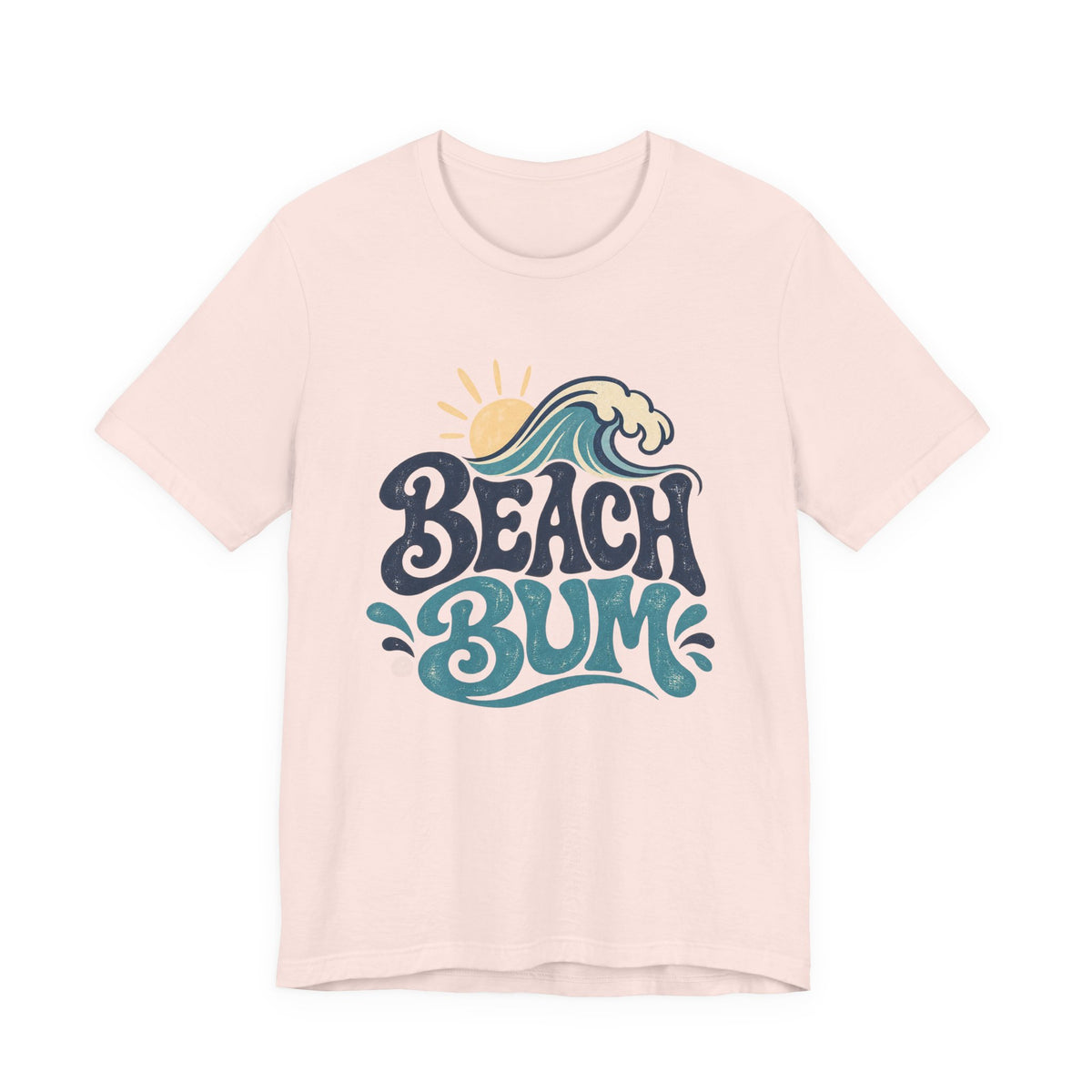 A pink t-shirt with a graphic design featuring the text "BEACH BUM" and a sun and wave motif.