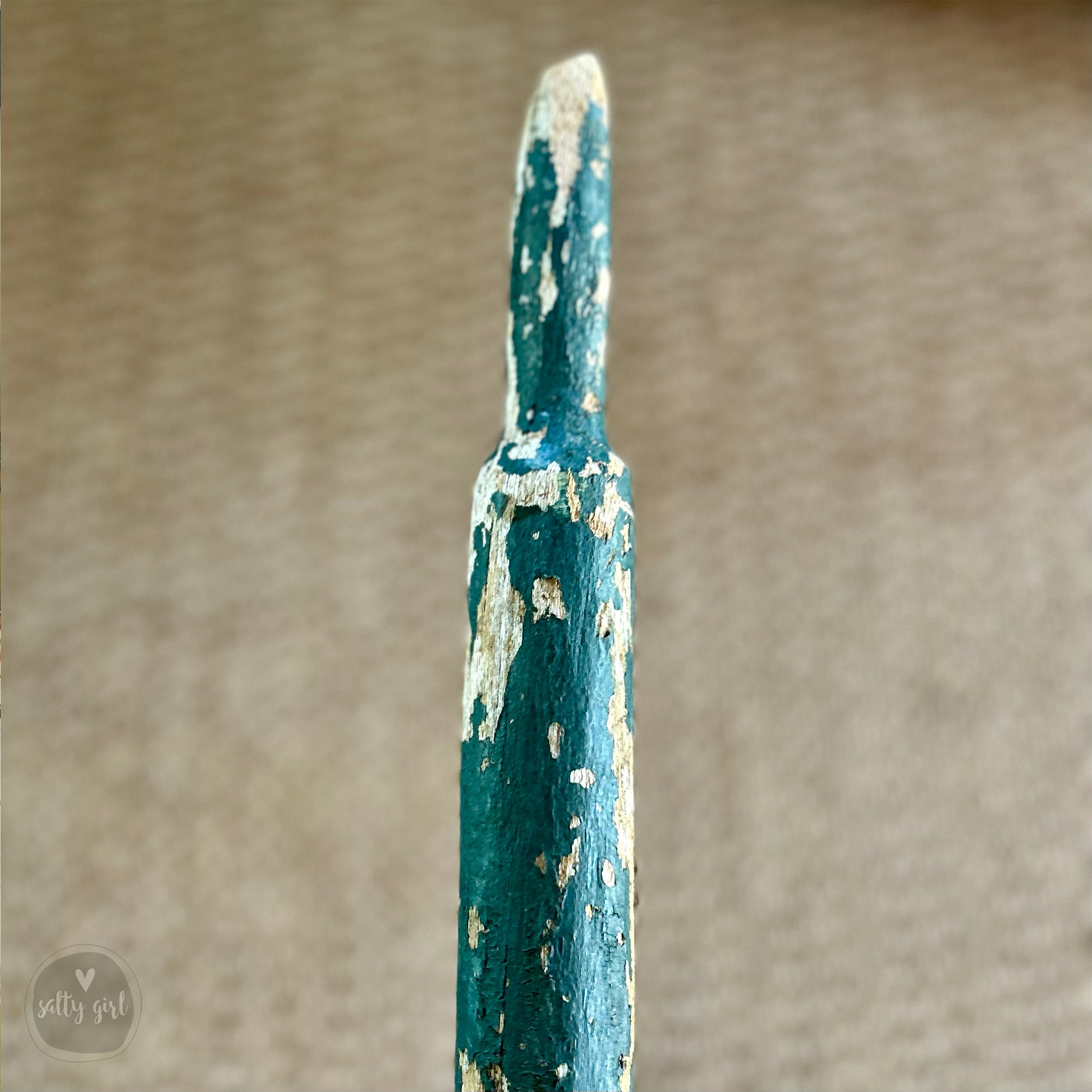 a close up of a rusted metal object