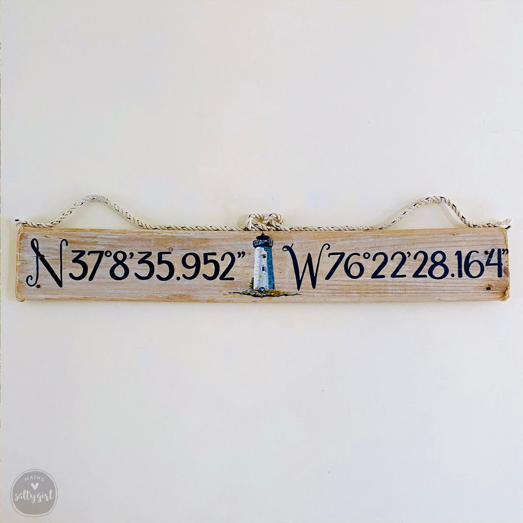 a wooden sign hanging on a wall