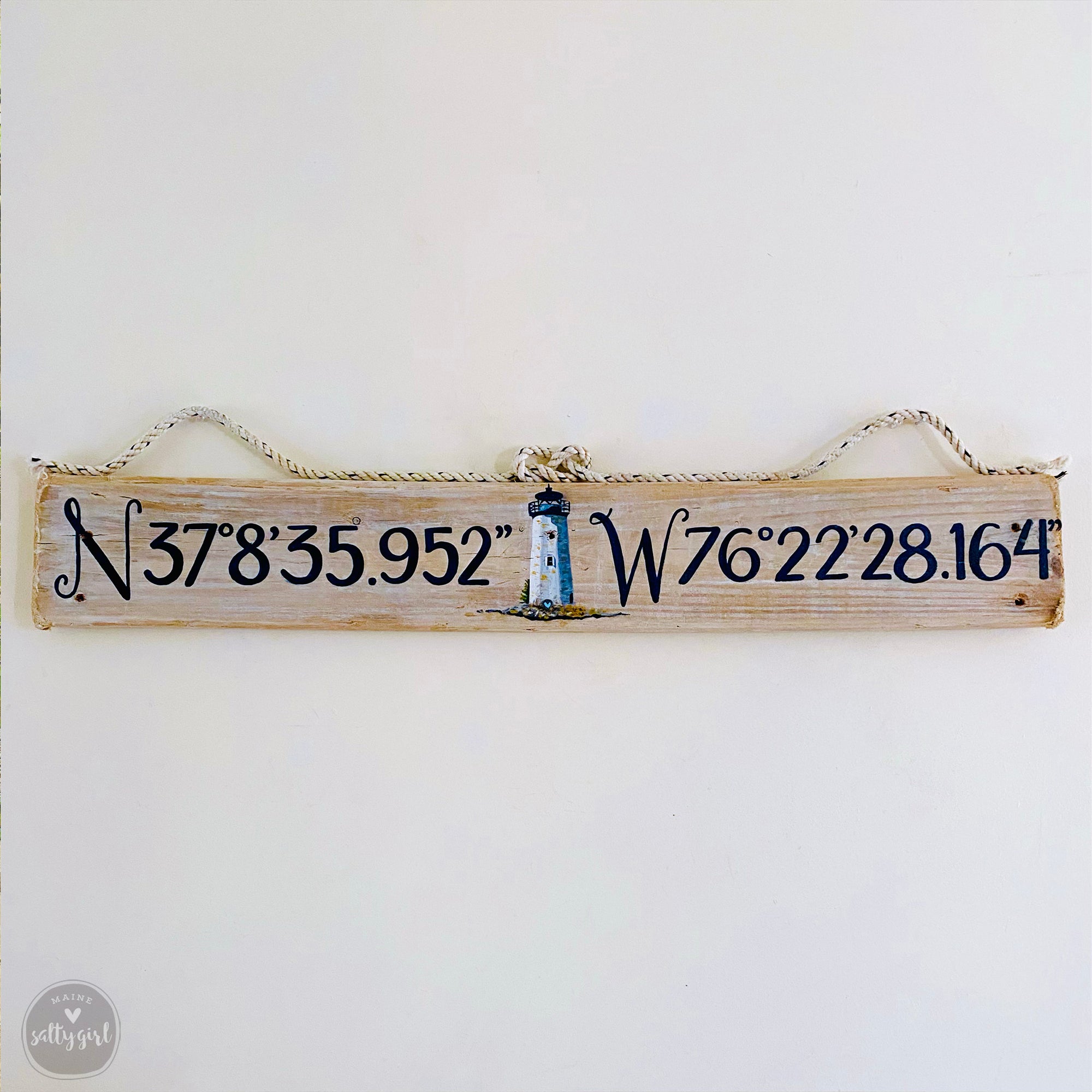 a wooden sign hanging on a wall