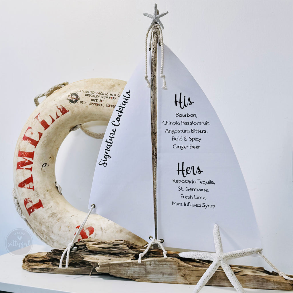 a sailboat and a life preserver on a table