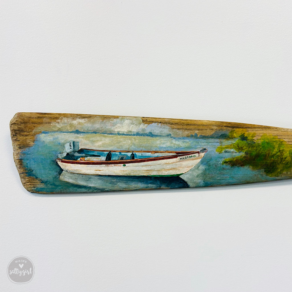 a painting of a boat floating on a body of water