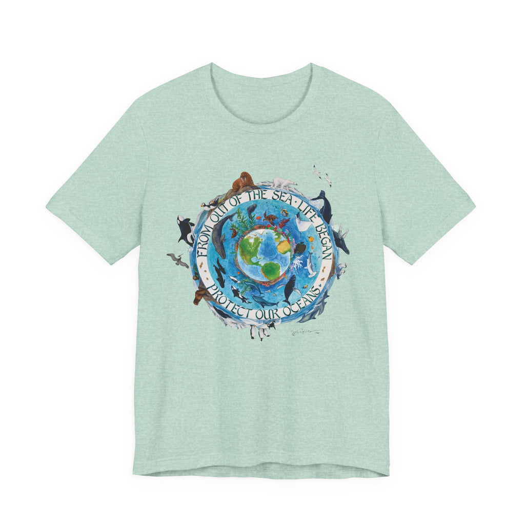 A light green Maine Salty Girl t-shirt with a circular design featuring a globe surrounded by various marine animals and text.