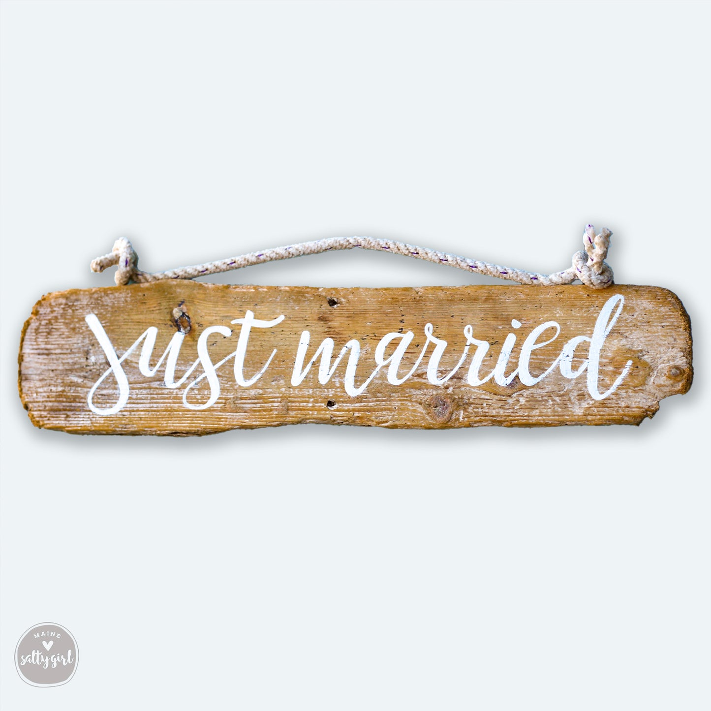 a wooden sign that says, just married