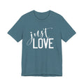 A teal-colored Maine Salty Girl t-shirt with the text "Just LOVE" printed on it in white lettering