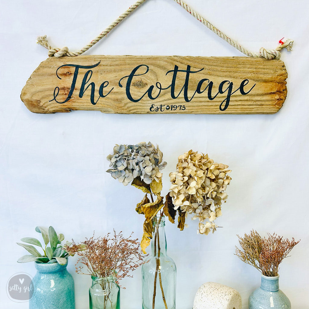 a group of vases sitting on top of a table