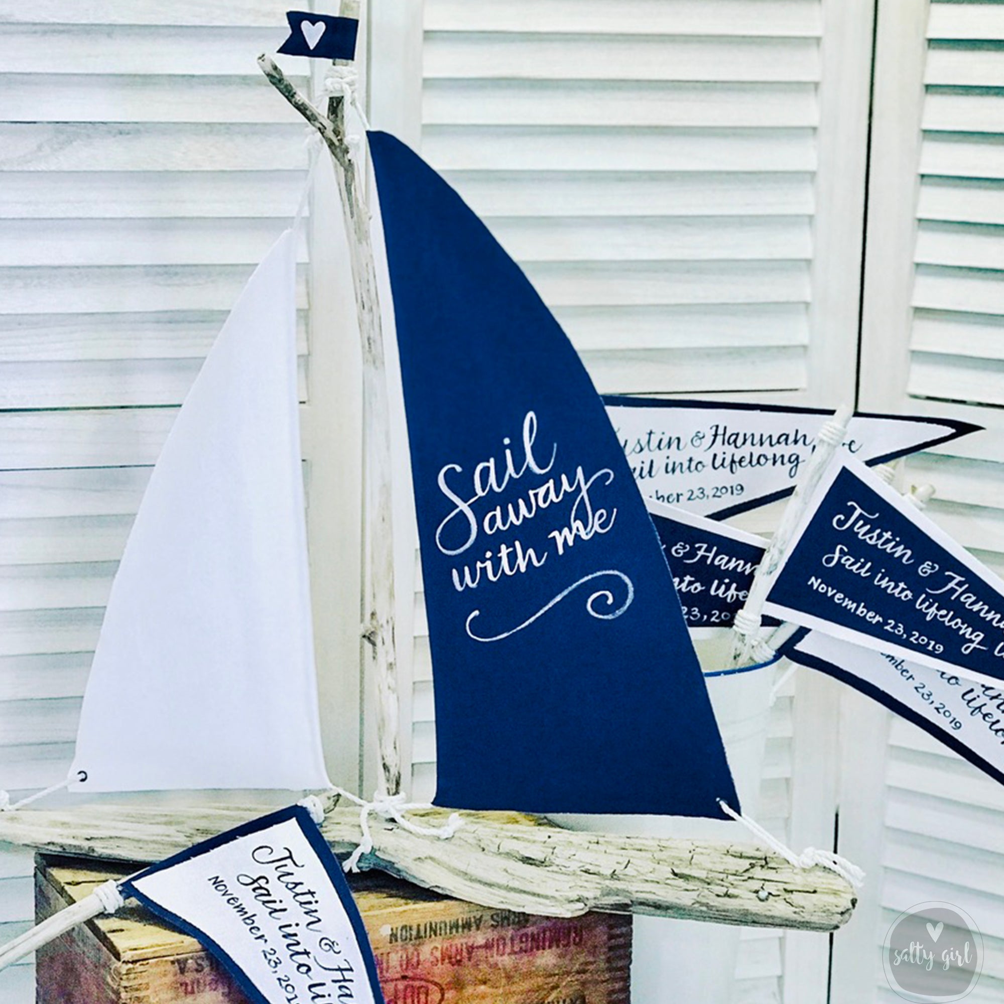 a sailboat made out of a wooden block