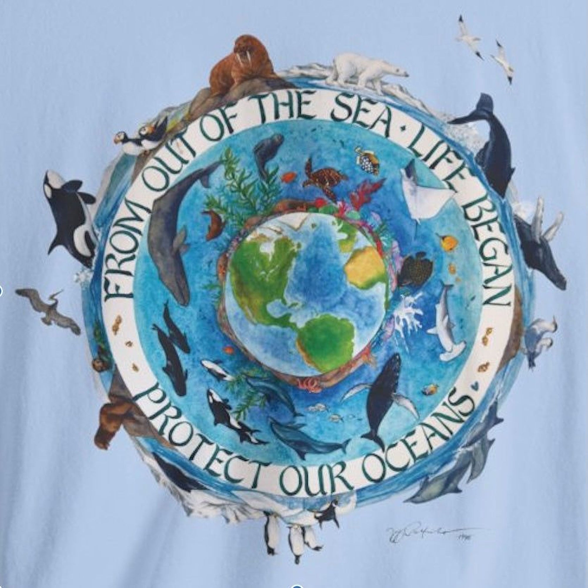 A Maine Salty Girl T-shirt design with ocean-themed graphics and text on a light blue background