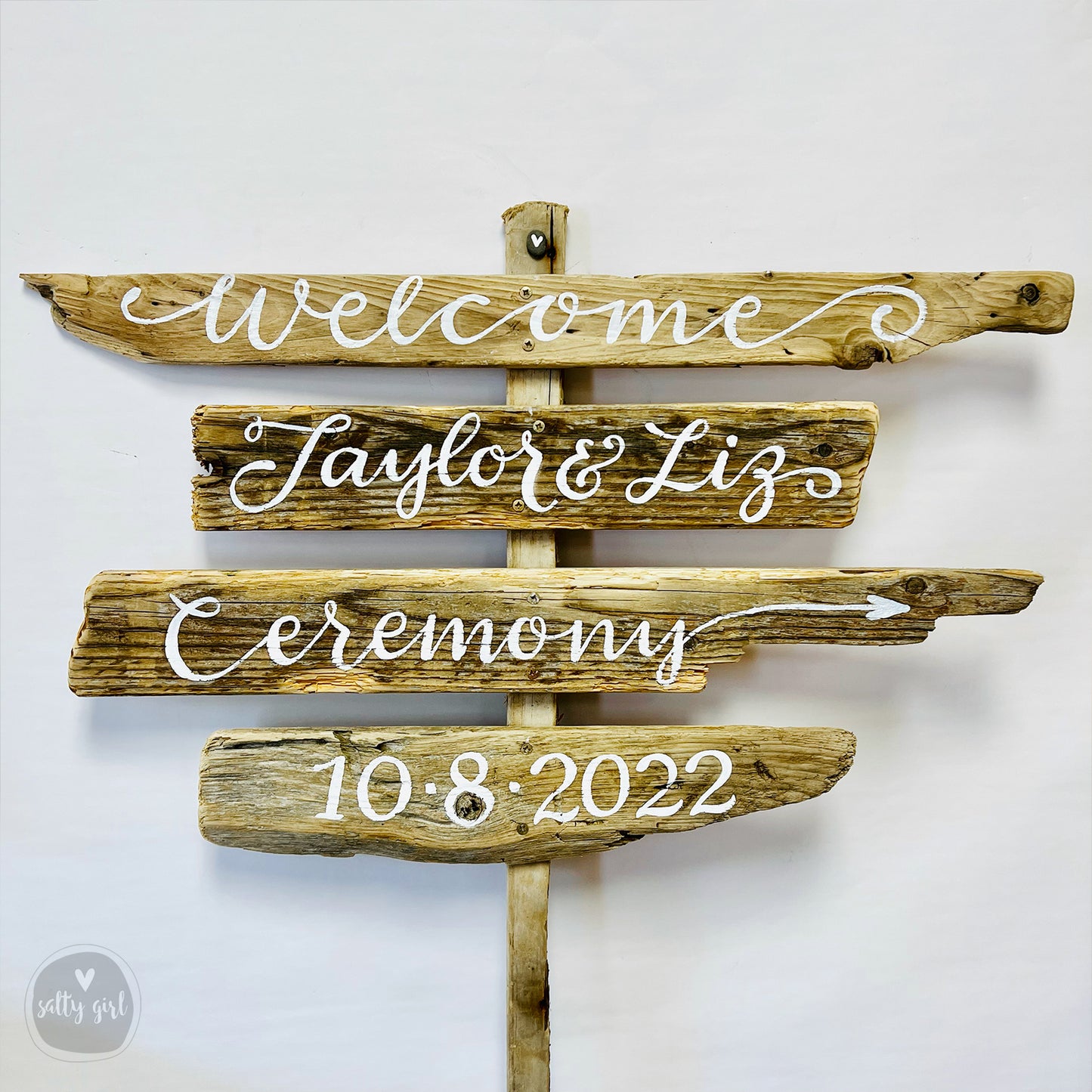 a wooden sign that says welcome to taylor and his ceremony