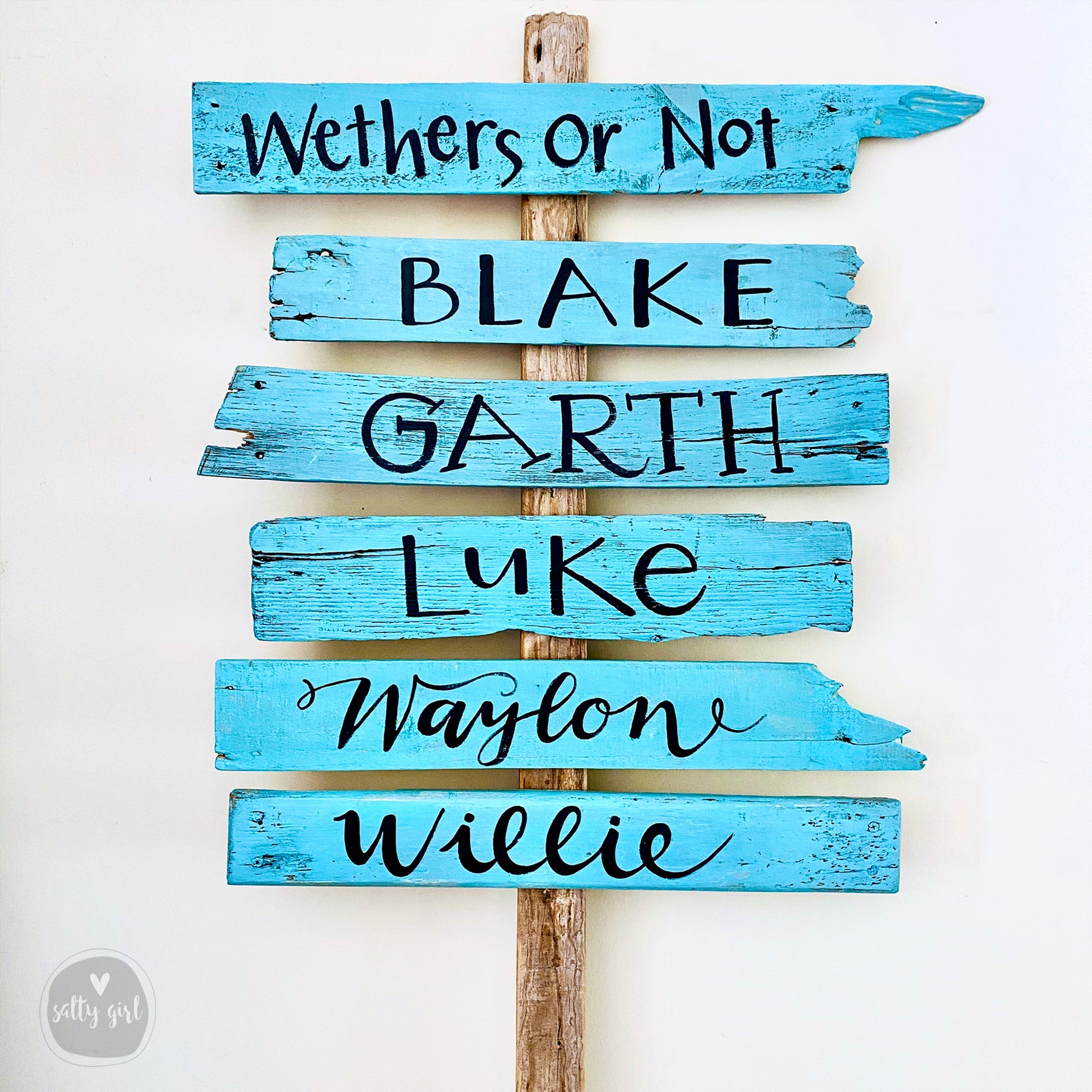 a wooden sign that says, we are the weather or not