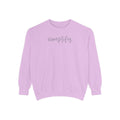 A pink sweatshirt with the word "simplify" printed on it.
