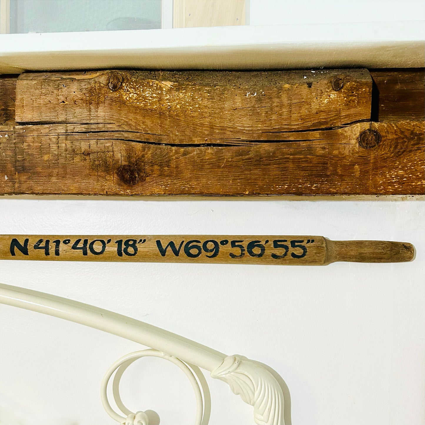 a close up of a wooden sign on a wall