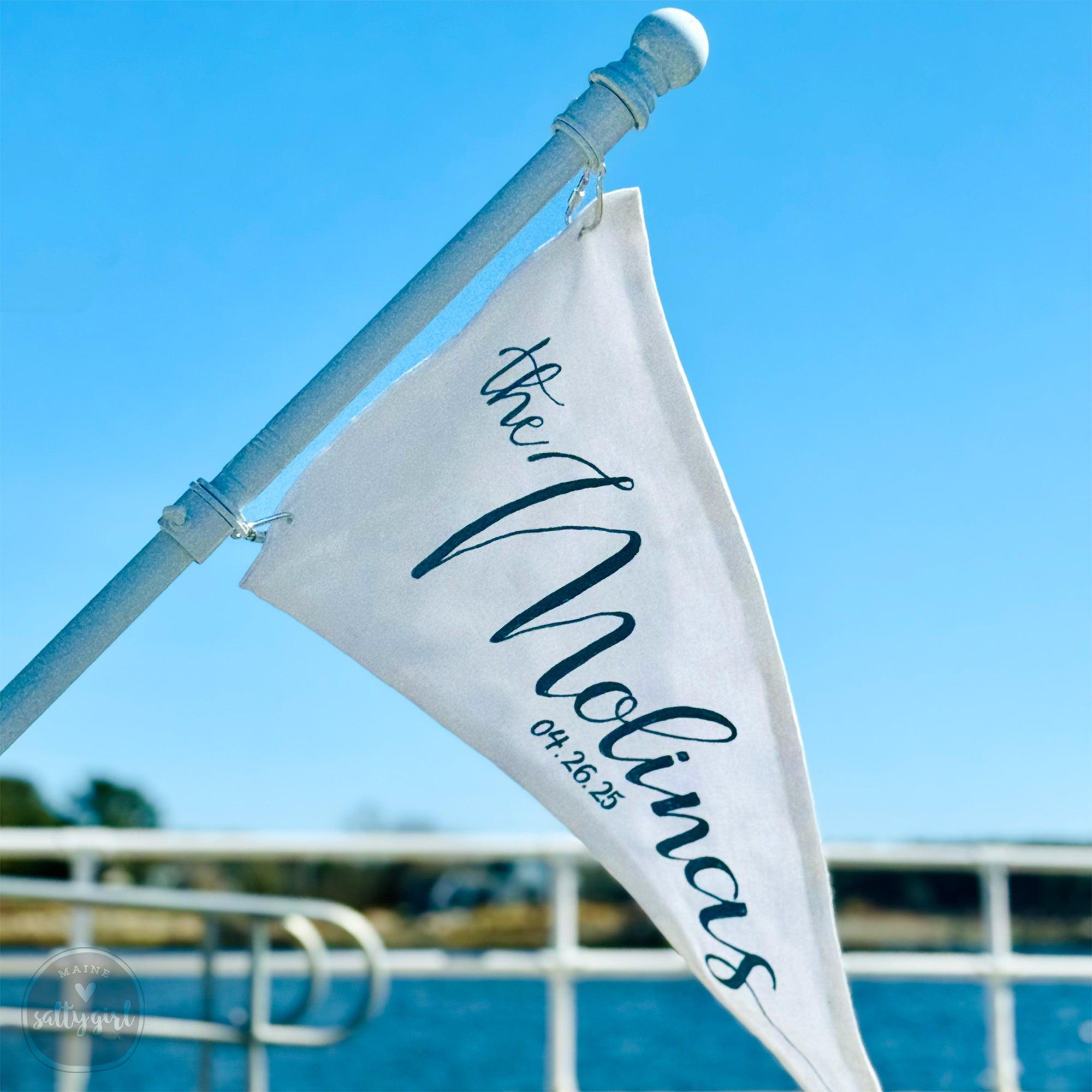 a white flag with the word welcome on it