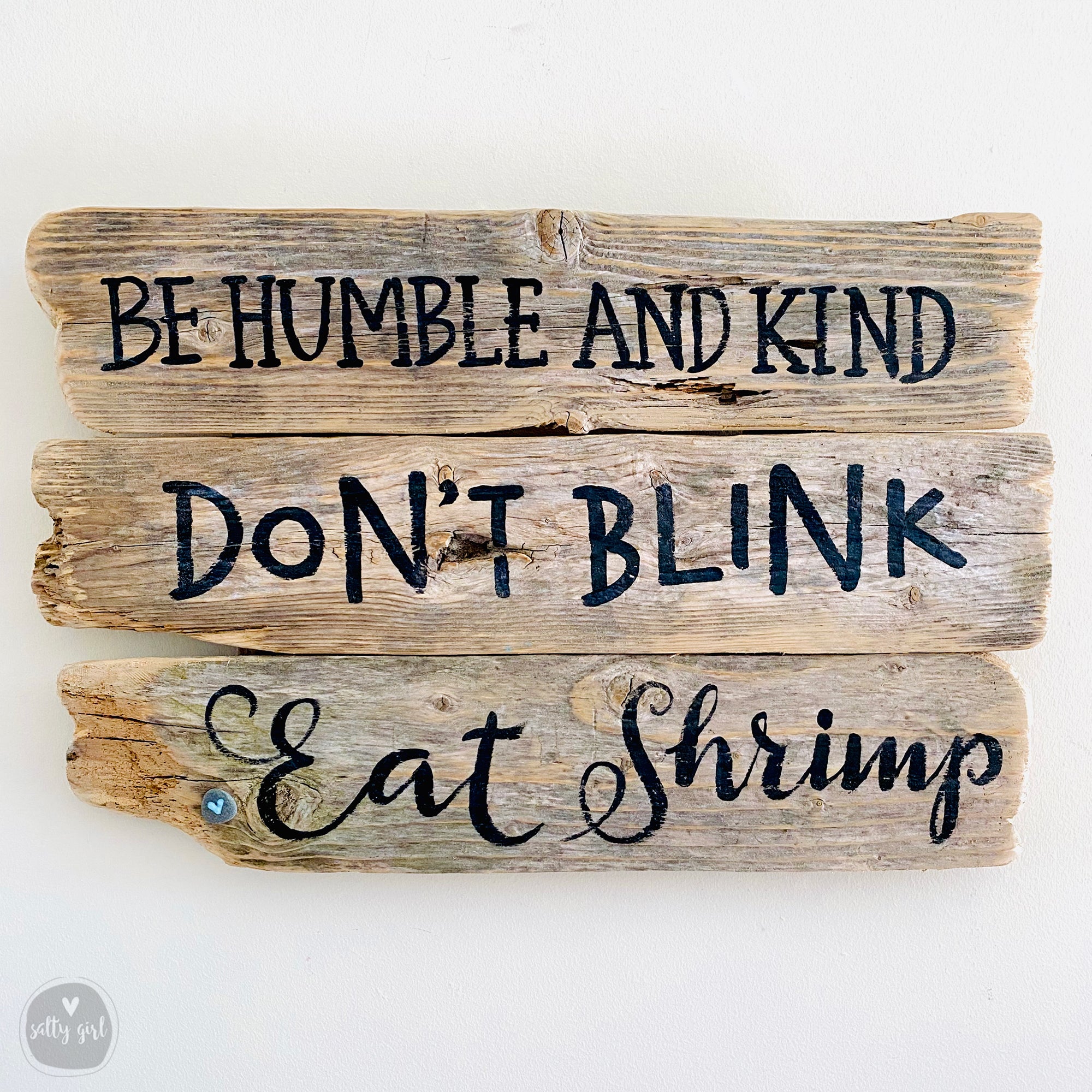 a wooden sign that says be humble and kind don't blink eat shrimp