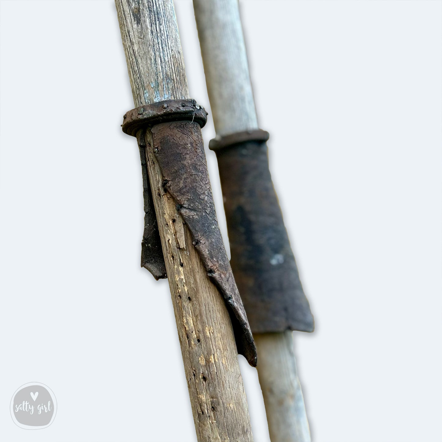 a close up of a wooden pole with a piece of wood sticking out of it