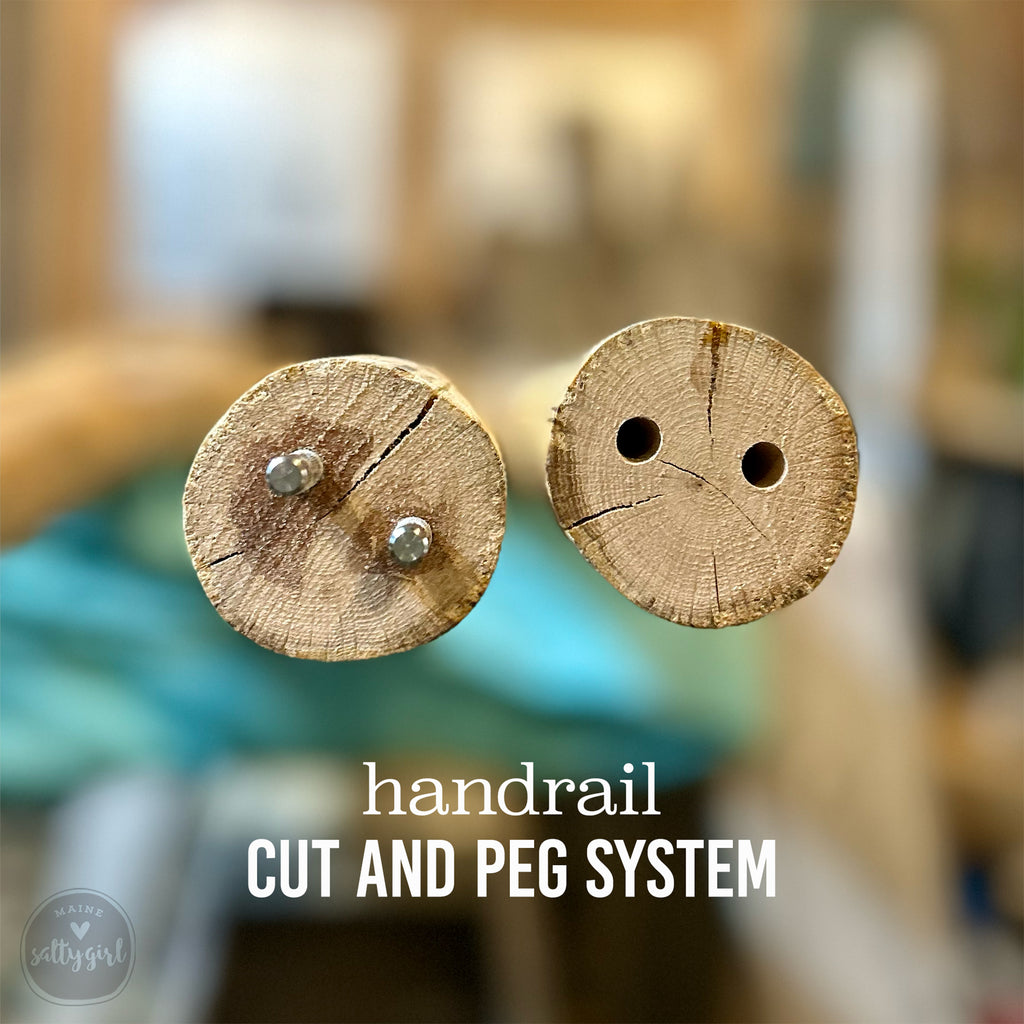 Two driftwood ends with metal components on a blurred background