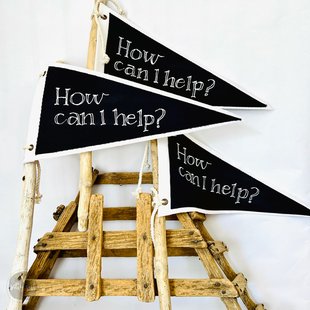 black and white flags table markers with lettering on antique lobster trap