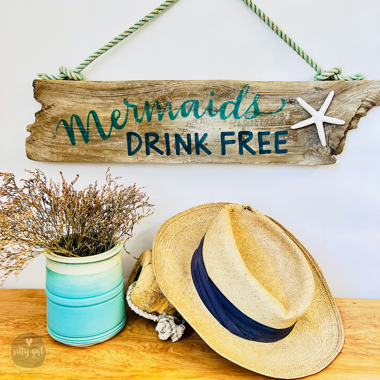 Driftwood "Mermaids Drink Free" Sign - Wooden Mermaid Sign with Fishing Rope Hanger and Starfish - Beachie Wall Decor