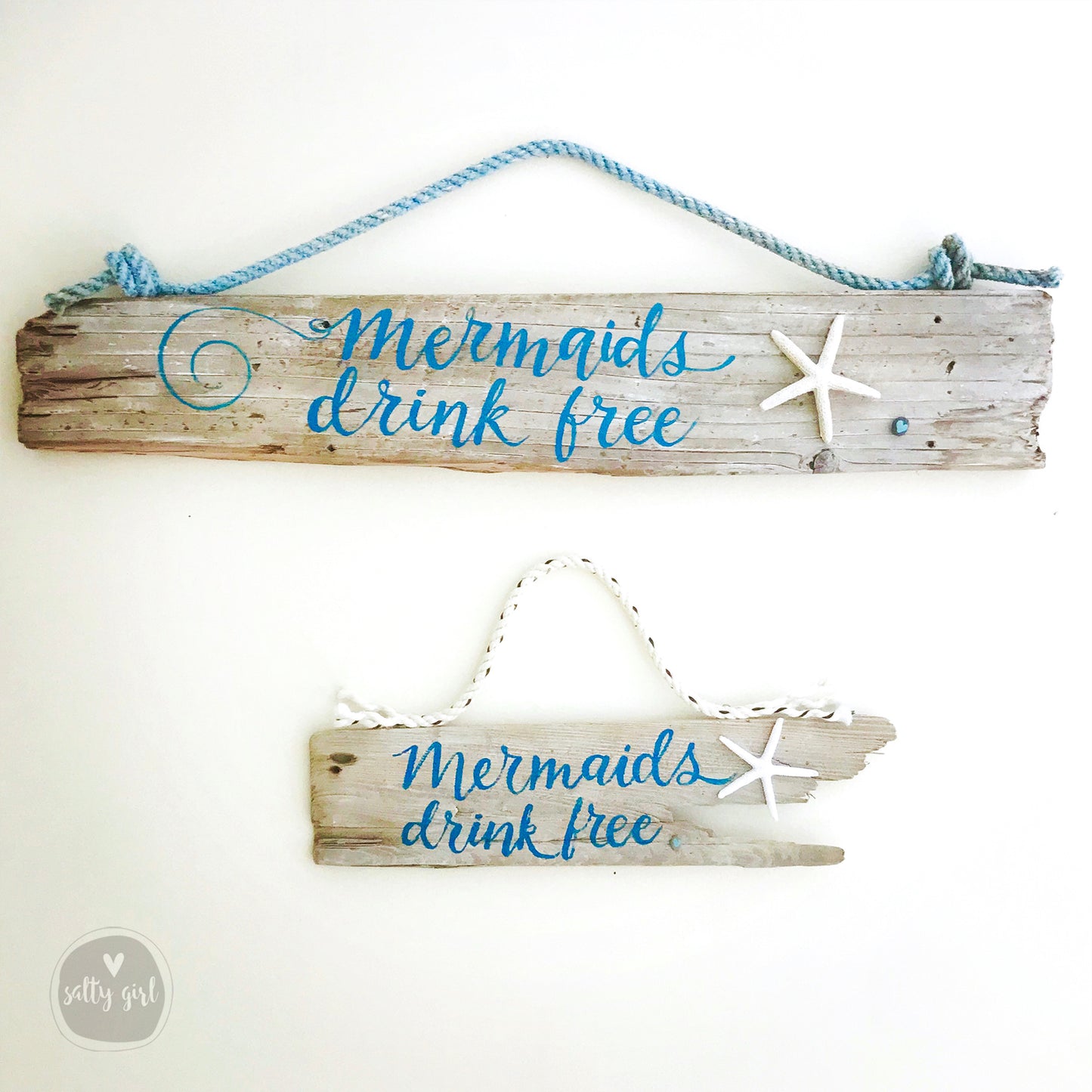 Driftwood "Mermaids Drink Free" Sign - Wooden Mermaid Sign with Fishing Rope Hanger and Starfish - Beachie Wall Decor