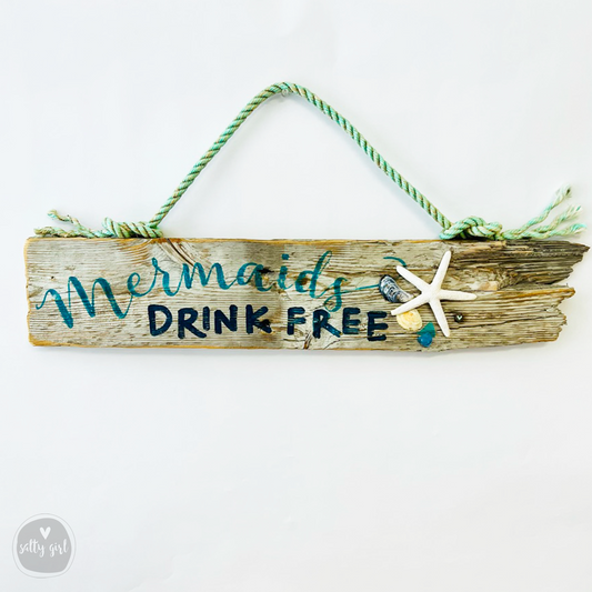 Driftwood "Mermaids Drink Free" Sign - Wooden Mermaid Sign with Fishing Rope Hanger and Starfish - Beachie Wall Decor