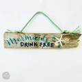 A wooden sign with the text "Mermaids drink free" written on it, hanging from a green rope.