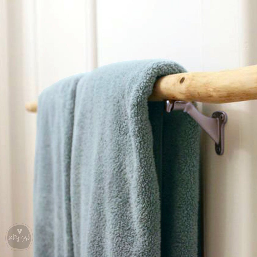 Driftwood Towel Bar with blue towel
